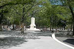 Workers put the finishing touches to the CANA Pave installation at Montreal’s Cabot Square.
